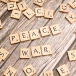 Conflict-situated cooperation: How Israeli and Palestinian IT professionals give meaning to cooperating under ethnonational conflict
